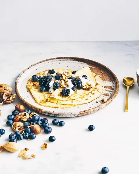 Coconut Crêpes with Coconut Yoghurt & Berries image